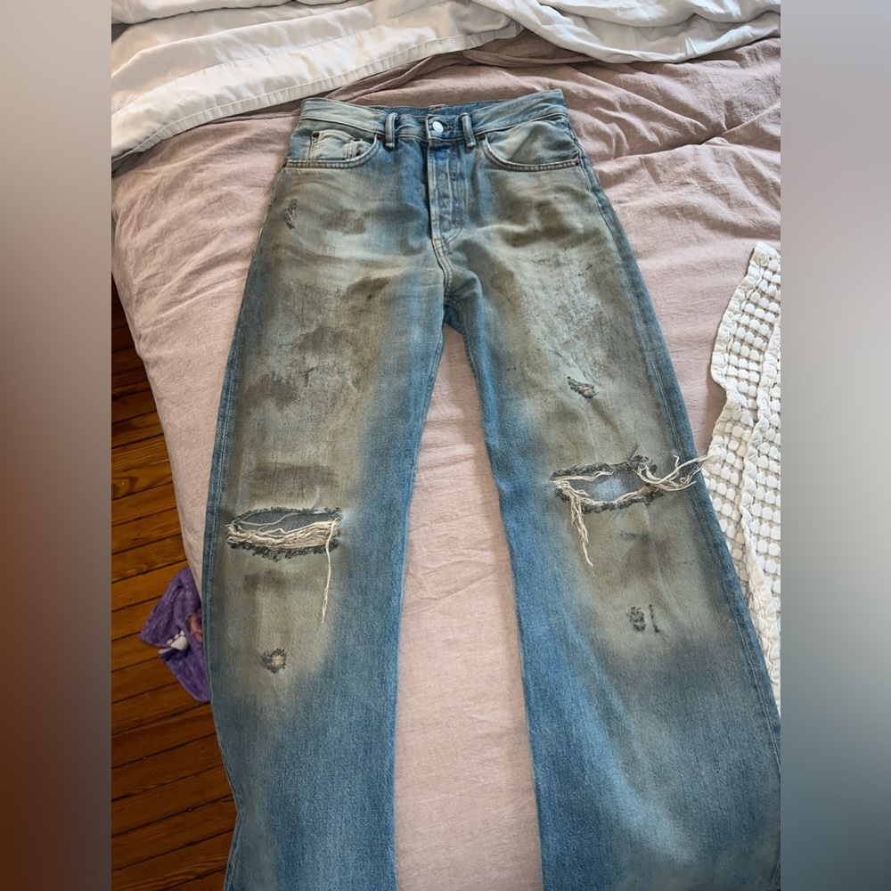 Acne Studios x Kylie Jenner Mud stained distressed denim jeans